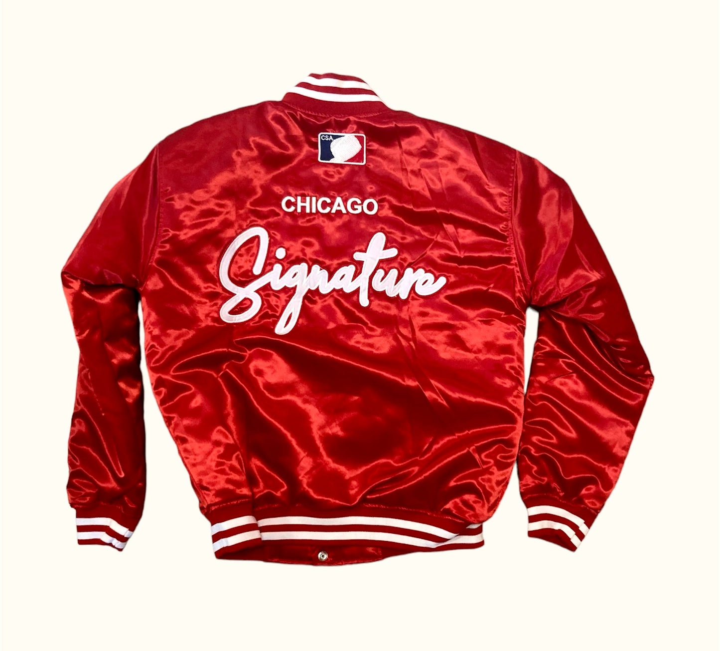 CHICAGO RED CHI SIGNATURE SATIN STARTER JACKET SHOWING CHICAGO SIGNATURE ON THE BACK OF THIS BEAUTIFUL RED COLOR JACKET ON A WHITE BACKGROUND