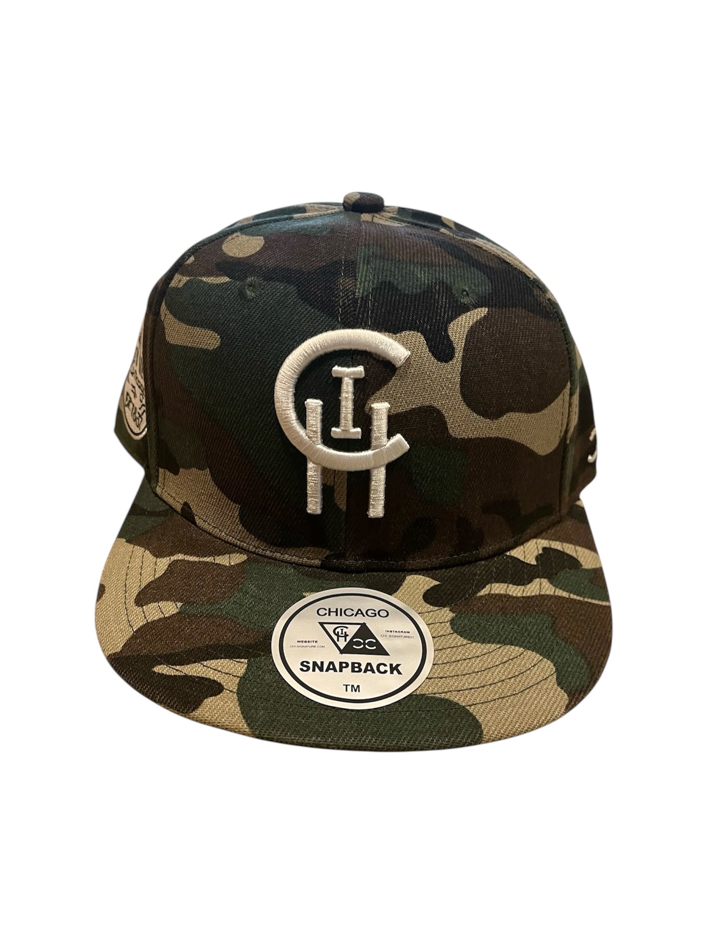 ARMY GREEN CAMOUFLAGE CHI SIGNATURE SNAPBACK WITH FRONT LOGO ON WHITE BACKGROUND