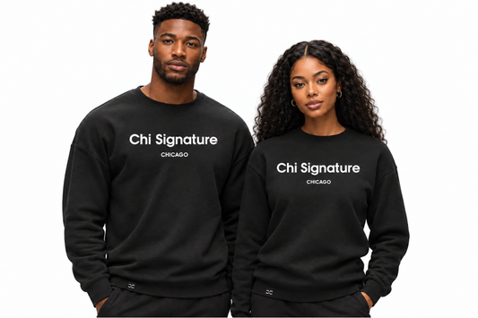 Male and female models wearing black Chi Signature crewneck sweatshirts with white “Chi Signature” and “CHICAGO” chest lettering and small white hem logos, against a white background.