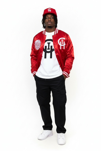 CHICAGO RED CHI SIGNATURE STARTER JACKET ON BLACK MODEL WITH SIGNATURE CLASSIC WHITE TSHIRT WITH BLACK LOGO AND RED CHI SNAPBACK